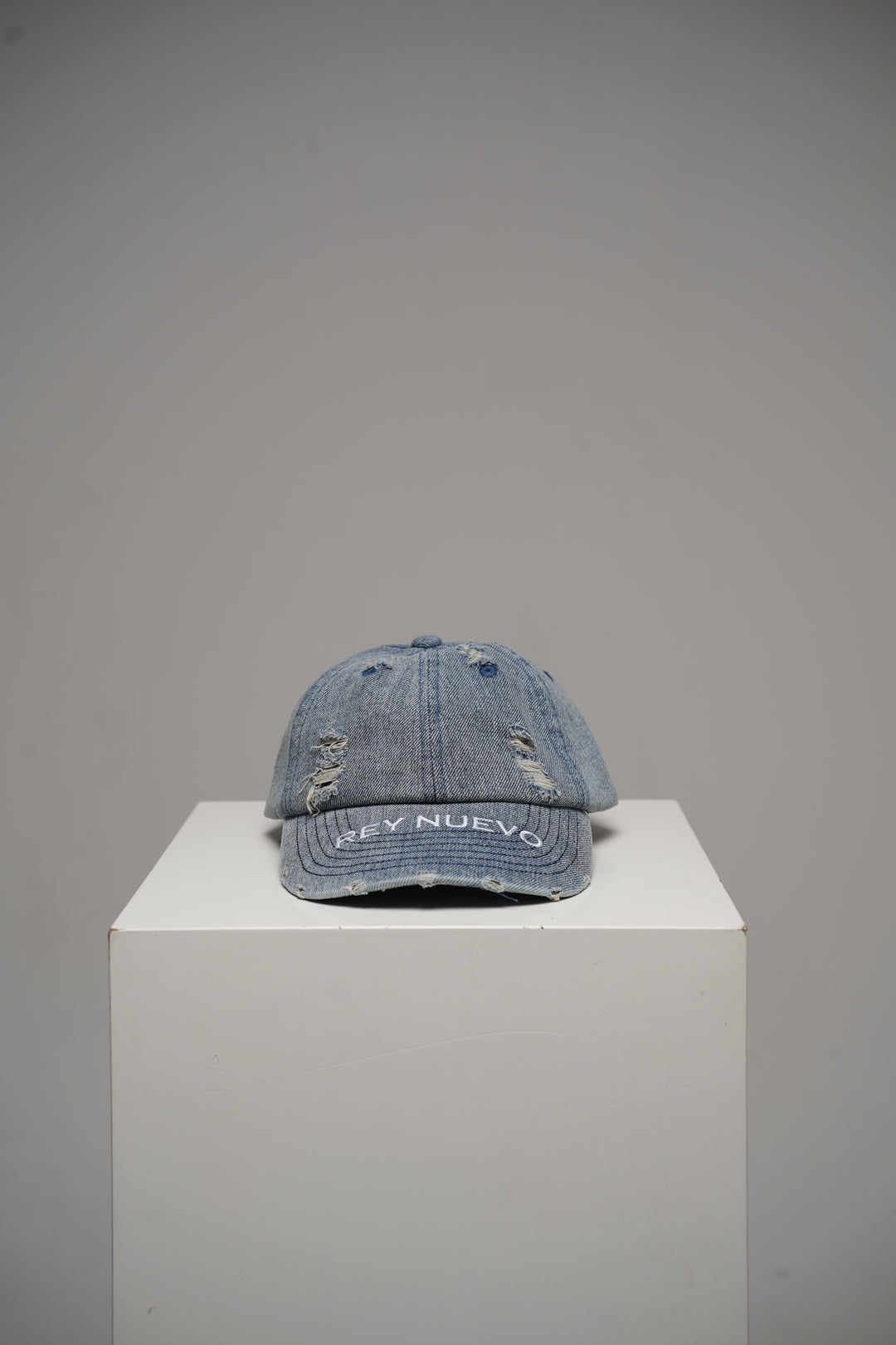 Distressed denim cap