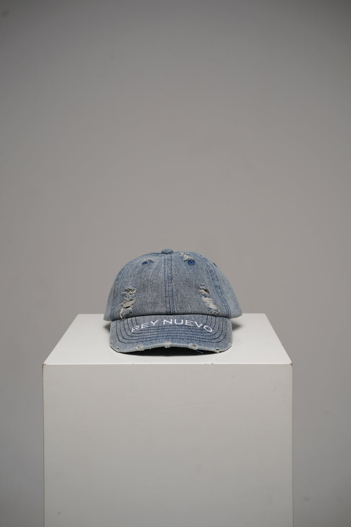 Distressed denim cap