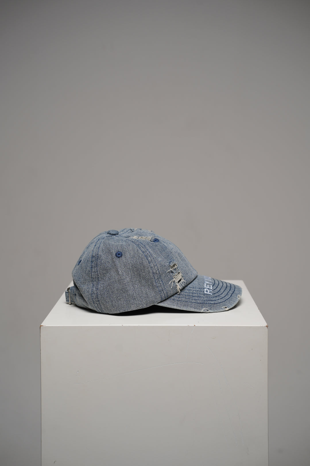 Distressed denim cap