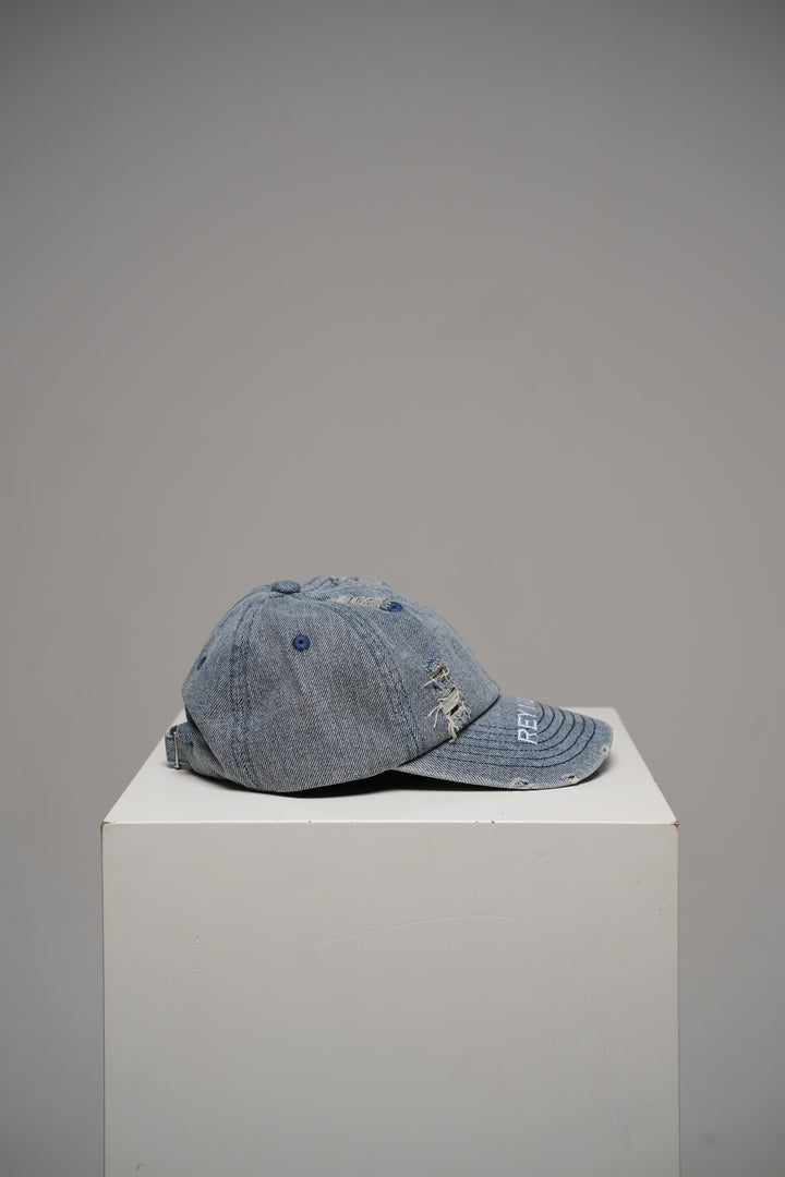 Distressed denim cap