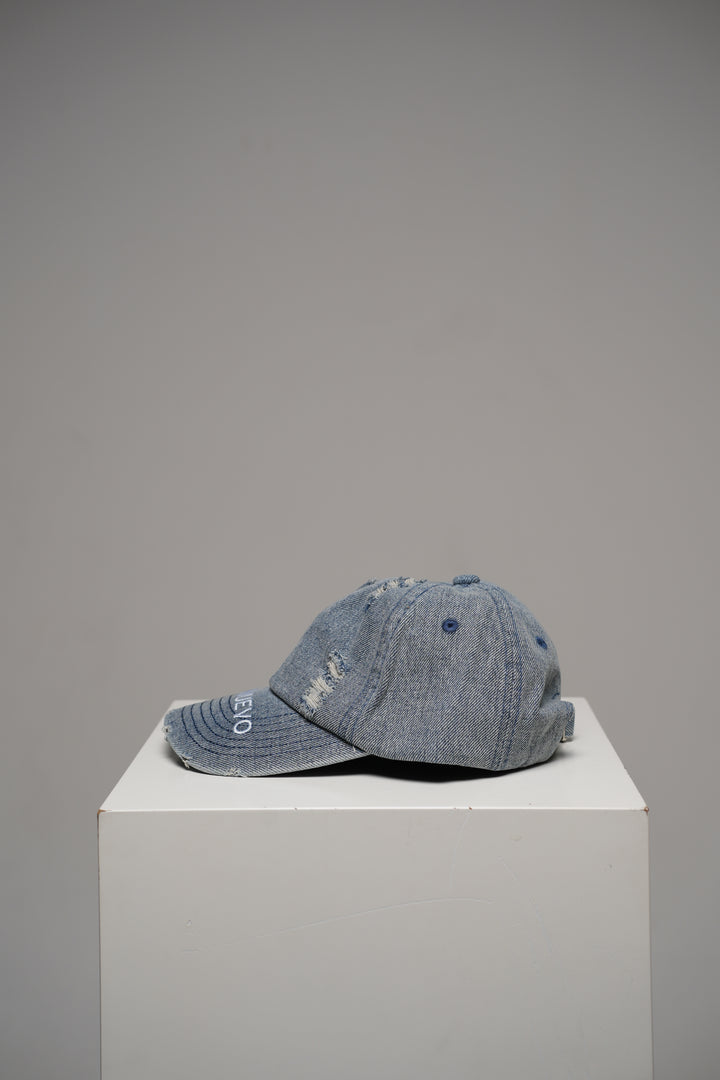 Distressed denim cap
